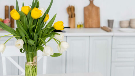 Bouquet on a table in a kitchen.