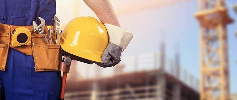 Man holding hard hat.