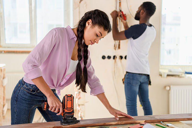 couple remodeling home project before winter