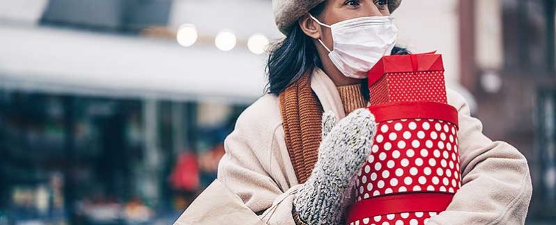Woman Christmas shopping in Brooklyn during 2020 pandemic