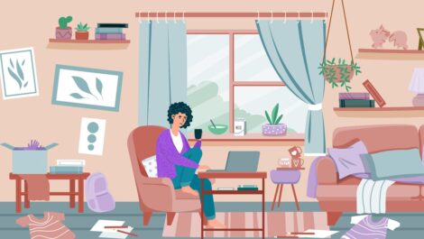 Woman drinking coffee in a cluttered home