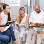 Entrepreneurs reading as a group