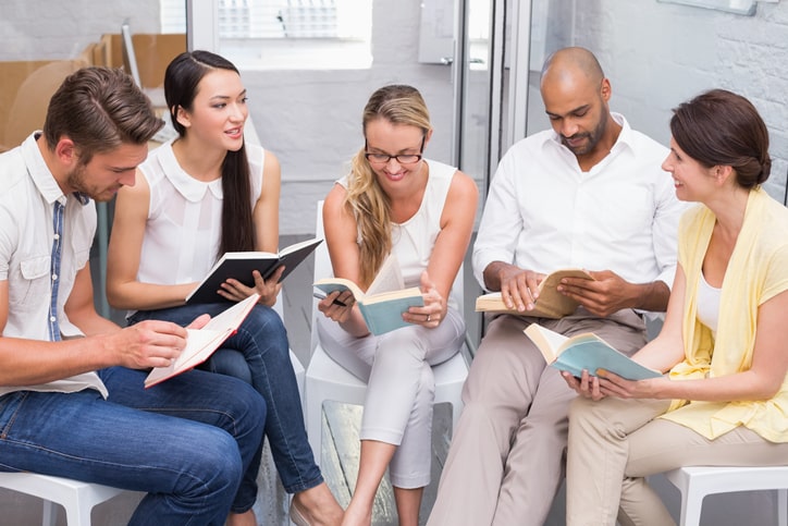 Entrepreneurs reading as a group