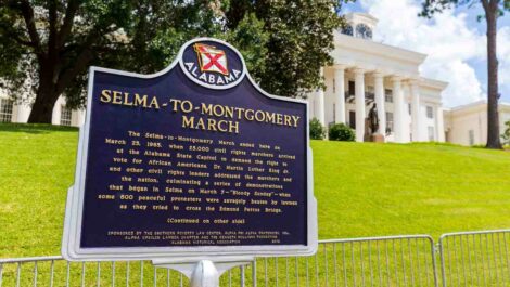 A sign in front of the Alabama State Capitol with information about the Selma-to-Montgomery March.