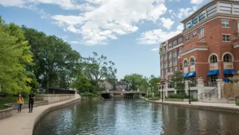 A canal near a large brick building